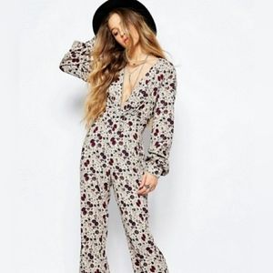 Free People Floral Jumpsuit.  Size 10.  New without tags. 52% viscose/48% rayon.